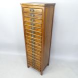 A Chinese elm 18-drawer collector's chest, 55cm x 149cm x 39cm