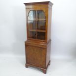 An early 20th century mahogany single-section bookcase, 55cm x 155cm x 40cm (with key)