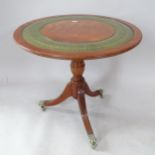 A reproduction mahogany circular-top occasional table, on tripod base, 52cm x 49cm