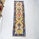 A Chobi Kilim runner, 207cm x 57cm