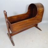 An Antique mahogany cradle on stand, 105cm x 88cm x 41cm