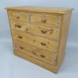 An Antique pine chest of 2 short and 3 long drawers, with applied decoration, 102cm x 96cm x 52cm