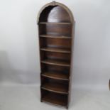 A 1920s oak dome-top 7-tier open bookcase, 53cm x 180cm x 24cm