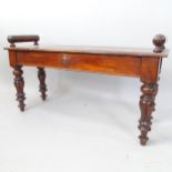 A 19th century mahogany window seat, with scrolled mounts on fluted legs, 92cm x 50cm x 28cm