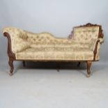 An Edwardian carved mahogany and upholstered settee longue, L170cm