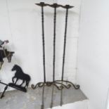 3 wrought-iron floor standing candle stands, H124cm