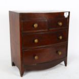 A mahogany apprentice piece table-top bow-front chest of drawers, W34cm, H37cm, D20cm