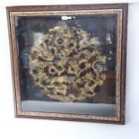 A large Chinese resin dragon and pearl roundel, framed, overall 82cm x 82cm