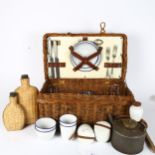 A 1930s motorcar travelling picnic set for 2 people, by G W Scott & Sons for Coracle, with many