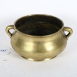 A Chinese bronze censer with scrolled handles, and 6 character mark to the base, height 8.5cm