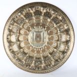 A large Egyptian brass Tutankhamun charger, diameter 69cm