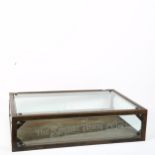 A Superdry Trading Co metal-bound glass table-top display cabinet, W60cm, H15cm, D40cm