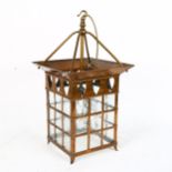 An Arts and Crafts style copper ceiling lantern, with heart motif, width 29cm, height 53cm