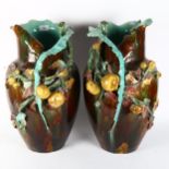 A large pair of 19th century Thomas Forester Majolica glazed pottery vases, of naturalist form