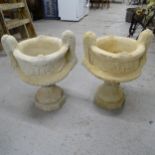 A pair of concrete 2-handled garden urn planters, on pedestals, W46cm, H58cm