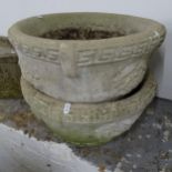 A pair of weathered concrete circular garden planters, W42cm, H22cm
