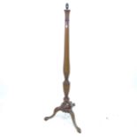 An early 20th century mahogany standard lamp on tripod base, height to bayonet fitting 159cm