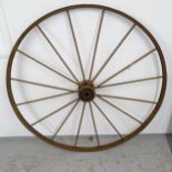 An Antique cast-iron carriage wheel, D141cm (WITH THE OPTION TO PURCHASE THE FOLLOWING LOT)