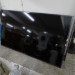 A LG 55" Smart TV, model no. 55UH661V, with remote. No stand
