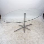 A contemporary design oval glass dining table, on 6-star chrome pedestal base, L160cm, H74cm, D90cm