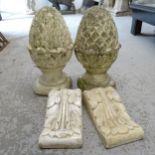 A pair of weathered concrete pineapple finials, H40cm, and a pair of composite brackets (4)