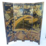 A Chinese black lacquered 4-fold draught screen, with allover gilded chinoiserie decoration, panel