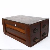 A bank of 4 stained oak and pine workshop drawers, W35cm, H23cm, D51cm