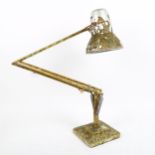 HERBERT TERRY - a Vintage mottled cream painted and gilded anglepoise desk lamp, shade diameter 14.