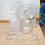 A group of glassware, to include 4 decanters and stoppers, water jug, vase, 2 candle stands etc
