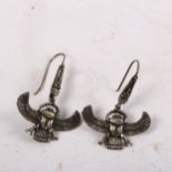 A pair of Egyptian silver scarab beetle earrings, on shepherd hook fittings, earring height 44mm,