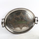 A Victorian silver plated oval 2-handled tea tray, with engraved decoration, width 63cm
