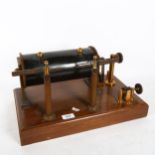 A Vintage induction coil spark machine, on stand, width 44cm