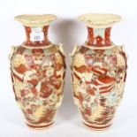 A pair of Japanese Kutani pottery vases, height 31cm
