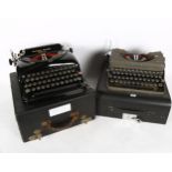 A Remington portable model 5 typewriter, and Imperial model T typewriter, both cased (2)