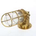 A brass ship's bulkhead wall lamp, length 26cm