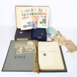 2 postage stamp albums, including 1 album relating to America and 1 album relating to world