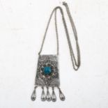 A silver filigree and turquoise set panel pendant necklace and chain
