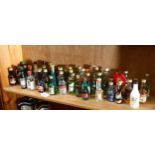 A large collection of miniatures, to include Maraschino, Calisay, Bombay Dry Gin, Royal French