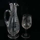 A Victorian glass wine ewer and matching stemmed glass, with wheel-cut fern decoration, glass