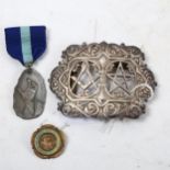 An Elizabeth II silver Masonic nurses buckle, Birmingham 1982, maker's mark for Toye, Kenning &