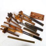 A group of woodworking mortice gauges and rules