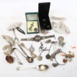 A collection of silver filigree brooches, a Siam silver and niello filigree panel bracelet etc