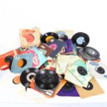 A quantity of vinyl 45s and singles, including The Beatles, Elvis Presley etc