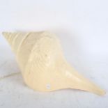 A large seashell converted to a lamp, with carved bird decoration, length 50cm