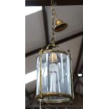 A Vintage brass-framed glass cylinder hanging lantern, height 80cm