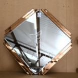 An Art Deco style peach and clear glass geometric mirror, etched design, width 72cm