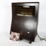 An Art Deco Thermovent FRC1 Bakelite heater, with automatic heat control, width 42cm, height 60cm,