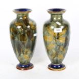 A pair of Royal Doulton Autumn Leaves baluster vases, height 31cm, 1 A/F