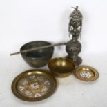 A collection of Eastern metalware bowls and dishes, including white metal hookah pipe base