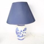 A Spode china Oriental design blue and white pattern lamp with shade, height including shade 60cm